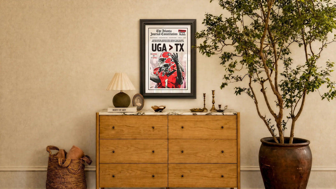 UGA > TX shown framed on a wall